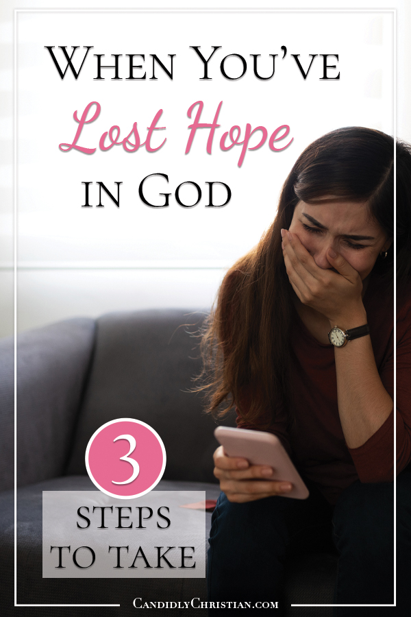 Woman distraught looking at her cell phone with the words: 3 steps to take when you've lost hope in God.
